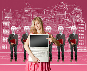 Image showing woman and lamp head businesspeople with laptop