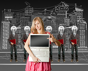 Image showing woman and lamp head businesspeople with laptop