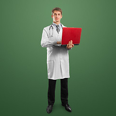 Image showing doctor male in suit with laptop in his hands