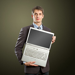 Image showing businessman with open laptop in his hands