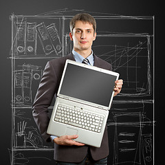 Image showing businessman with open laptop in his hands