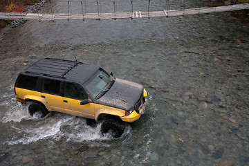 Image showing jeep crossing a river