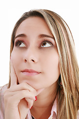 Image showing A thinking woman, isolated on white