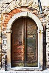 Image showing Old Wooden Door with Letter Slot in Italy