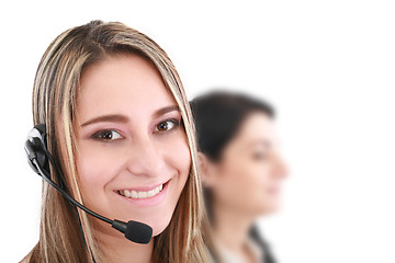 Image showing Beautiful representative smiling call center woman with headset.