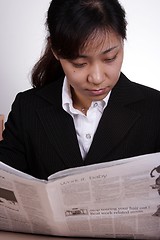 Image showing Asian Businesswoman Reading