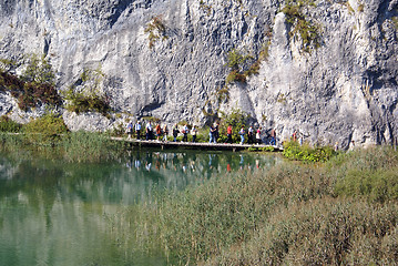 Image showing Tourists on the lake