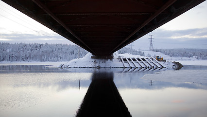 Image showing Road bridge. View from below. winter Landscape