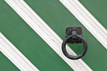 Image showing old pattern gate with a knocker