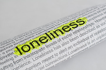 Image showing Typed text Loneliness on paper