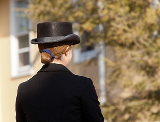 Image showing Kentucky riding hat on lady