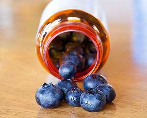 Image showing Blueberries in drug bottle