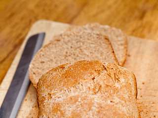 Image showing Sliced wheat bread and jam