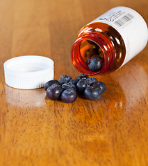 Image showing Blueberries in drug bottle