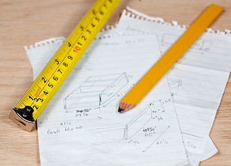 Image showing Carpenter pencil and rule on plans