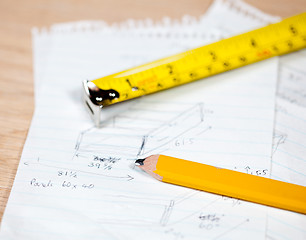 Image showing Carpenter pencil and rule on plans