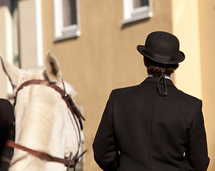 Image showing Kentucky riding hat on man