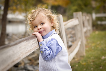 Image showing Adorable Young Boy Playing Outside