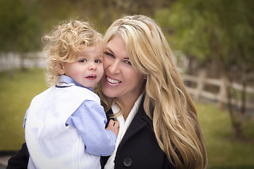 Image showing Attractive Mother and Son Portrait Outside