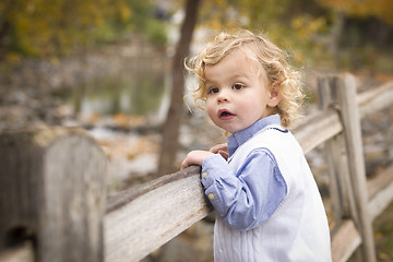 Image showing Adorable Young Boy Playing Outside