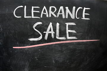 Image showing Clearance sale written on a blackboard