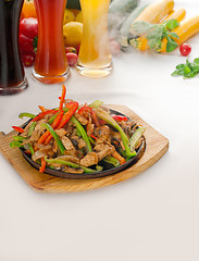 Image showing original fajita sizzling hot  on iron plate