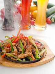 Image showing original fajita sizzling hot  on iron plate