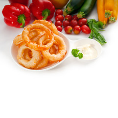 Image showing golden deep fried onion rings 
