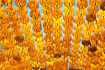 Image showing Yellow paper lanterns in buddhist temple