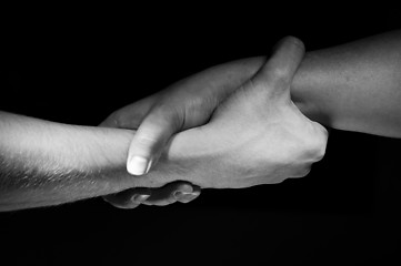 Image showing Hands unite with eachother as friends greeting