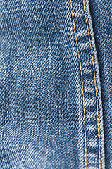 Image showing Orange stitch on the denim garment