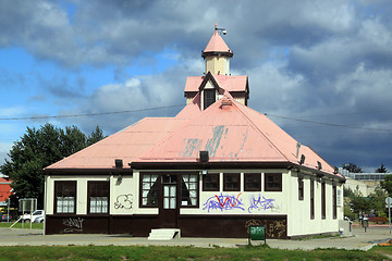 Image showing Building with pink roof