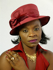 Image showing Black woman wearing red hat