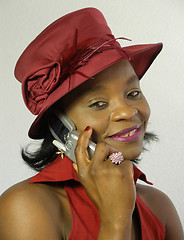 Image showing Black woman with a cellular phone