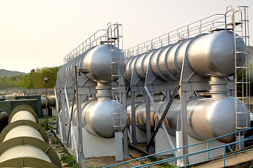 Image showing oil tanks and pipes outdoor at day 