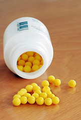 Image showing Yellow dragee pills