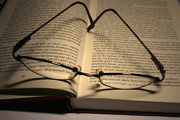 Image showing book and glases