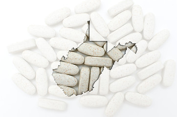 Image showing Outline map of west virginia with transparent pills in the backg