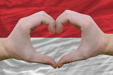 Image showing Heart and love gesture showed by hands over flag of indonesia ba