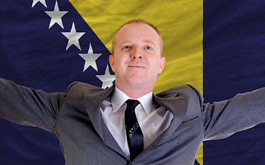 Image showing happy businessman because of profitable investment in bosnia her