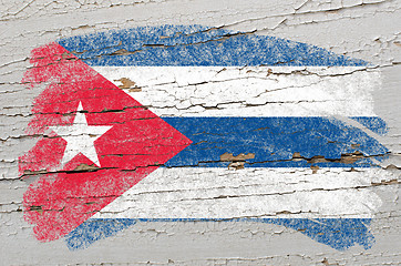 Image showing flag of cuba on grunge wooden texture painted with chalk  