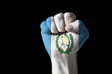 Image showing Fist painted in colors of guatemala flag