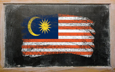 Image showing flag of Malaysia on blackboard painted with chalk  