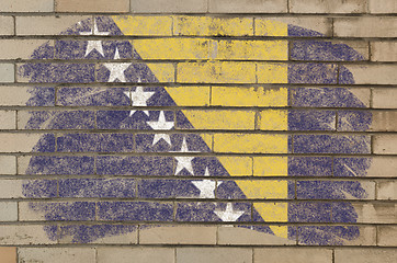 Image showing flag of bosnia and herzegovina on grunge brick wall painted with