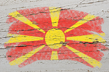 Image showing flag of macedonia on grunge wooden texture painted with chalk  