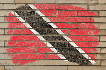 Image showing flag of trinidad and tobago on grunge brick wall painted with ch