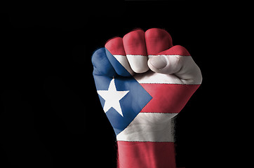 Image showing Fist painted in colors of puertorico flag