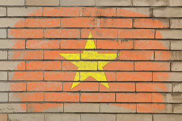 Image showing flag of vietnam on grunge brick wall painted with chalk  