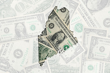 Image showing Outline map of maine with transparent american dollar banknotes 