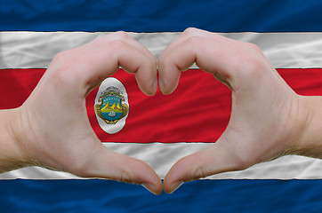 Image showing Heart and love gesture showed by hands over flag of costa rica b